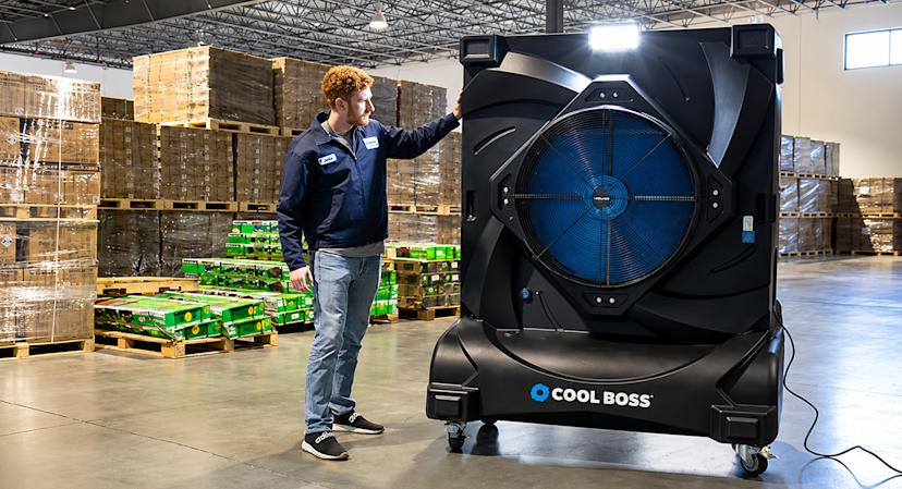 Warehouse-Technician-Inspecting-Cool-Boss-Unit
