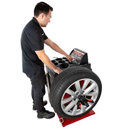 APEX by BendPak AB28 Wheel Balancer in Use
