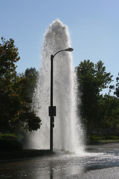 Water Main Break Geyser Flooding City Street