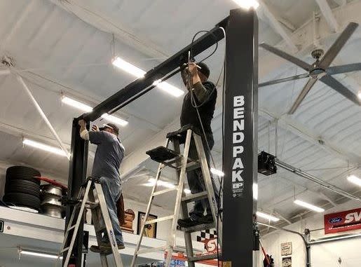 How Equalization Cables Keep a Two-Post Lift Level and Stable