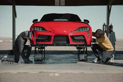 Toyota GR Supra on QuickJack for Track Service