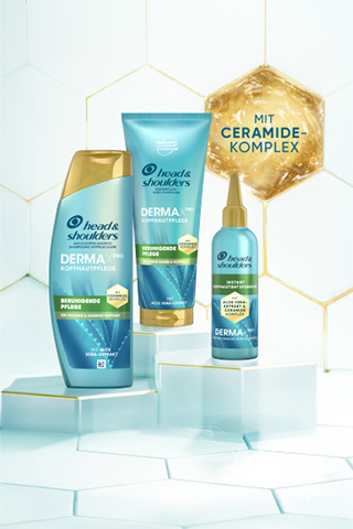 Head & Shoulders Dermaxpro Beruhigend Shampoo, Pflegespülung und Kopfhausmaske neben Kaktus- und Aloestückchen