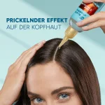 Infografik: eine Fraue, die DERMA Xᴾᴿᴼ REVITALISER TAG & NACHT LEAVE-ON auf ihrer Kopfhaut verwendet – PRICKELNDER EFFEKT AUF DER KOPFHAUT