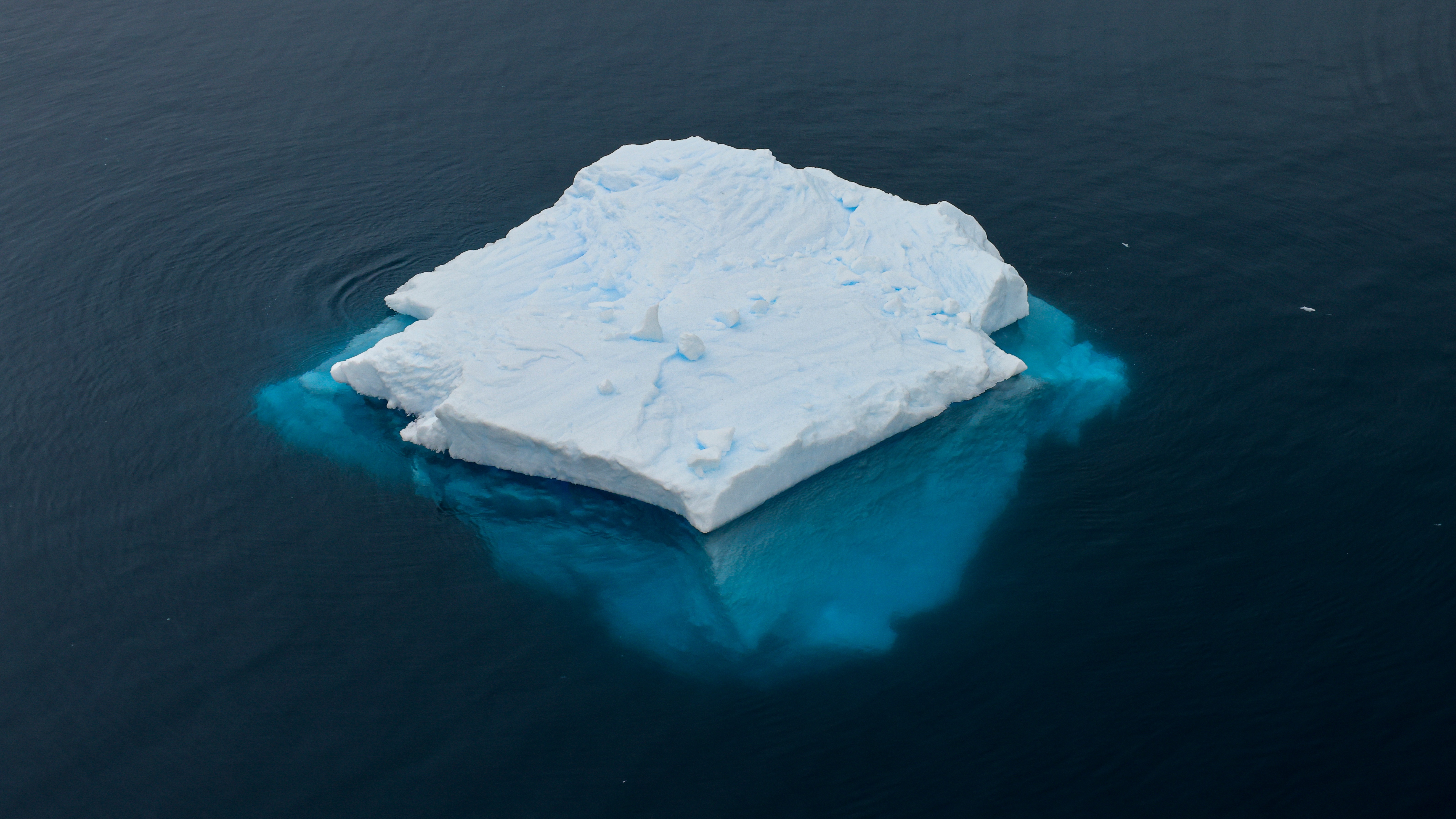 Iceberg in water with the tip above the surface