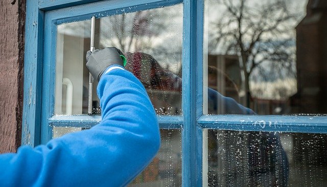 cleaning-windows-outside-home