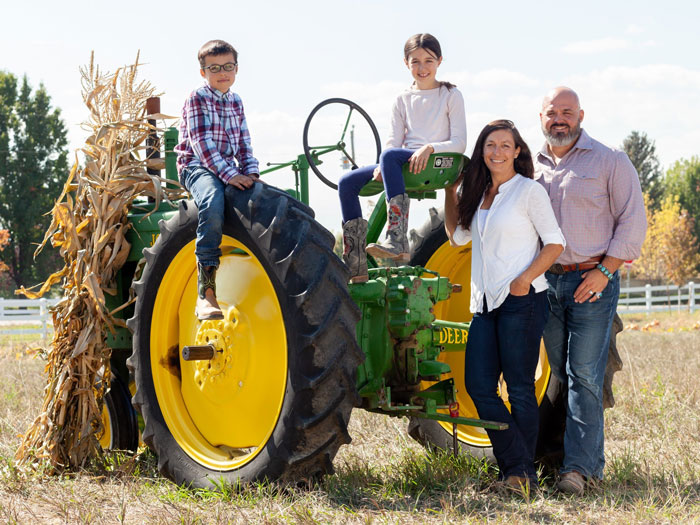 The Ian Bennet Family on a tractor