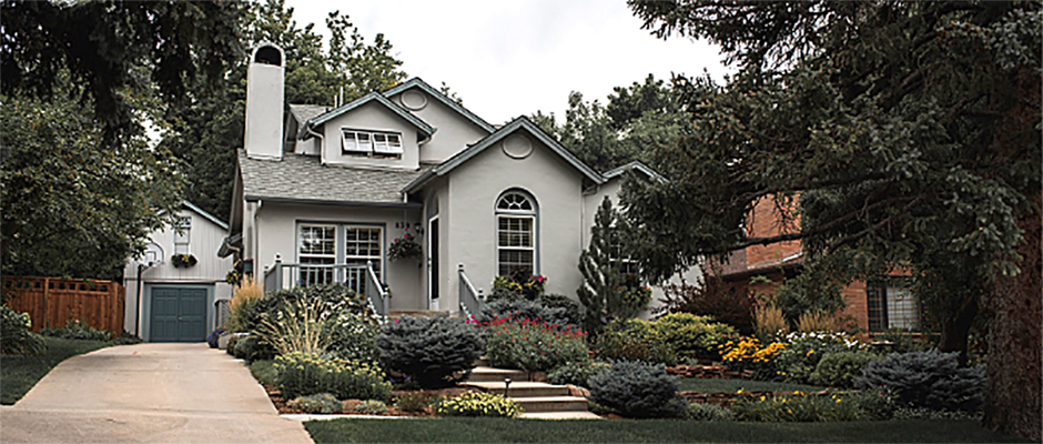 Residential house with front yard flower garden