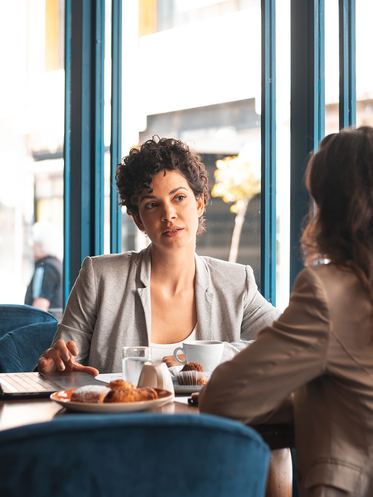 Two business woman having a business lunch