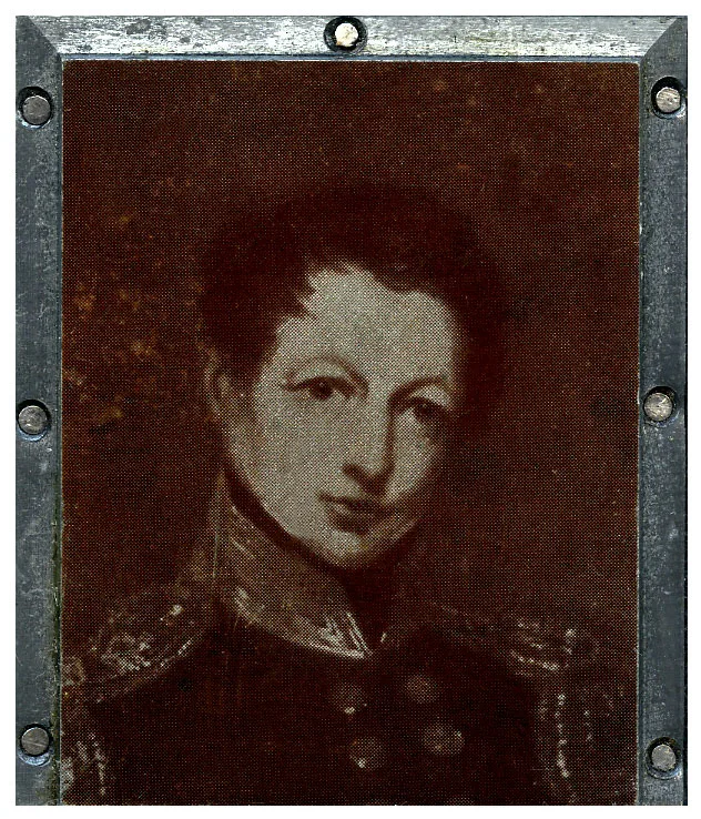 A black and white portrait of a young man with black hair and wearing a military uniform