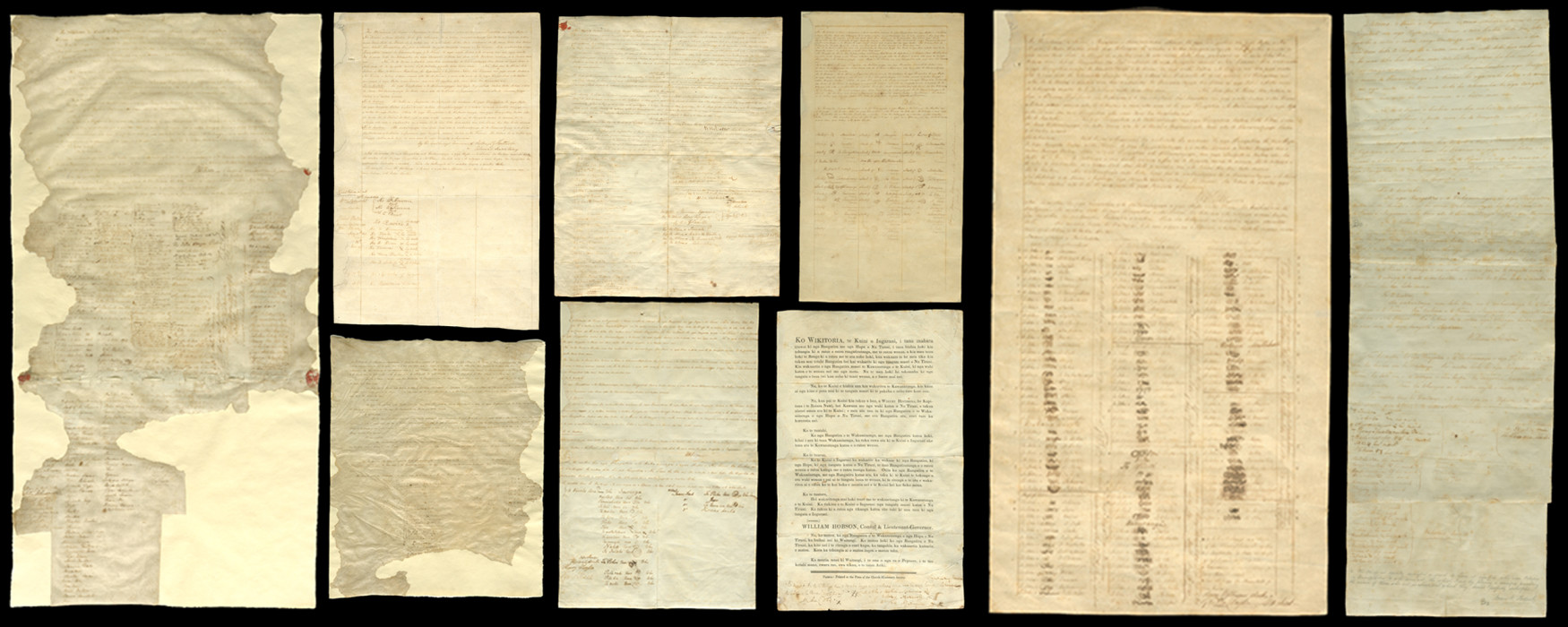 The Treaty of Waitangi - Te Tiriti o Waitangi Sheets of parchment and old paper with script and signatures on a black background