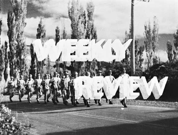 The title "Weekly Review" laid over an image of soldiers marching.
