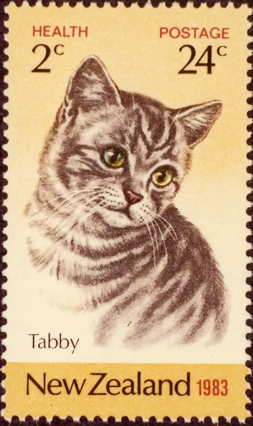 24 cent postage stamp with a cute tabby cat illustration