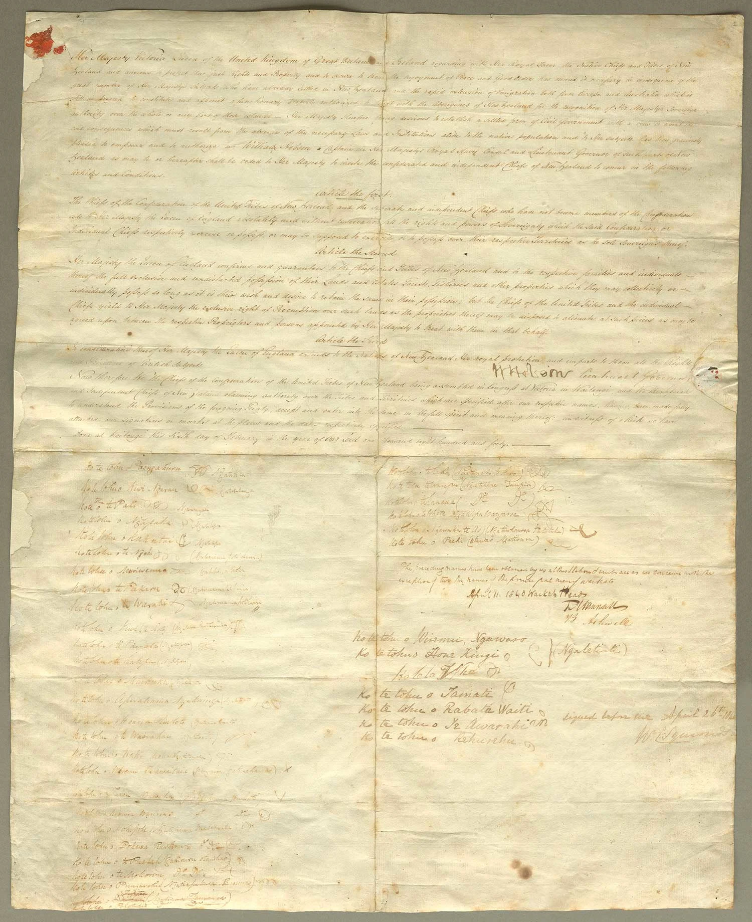 A rectangular sheet of paper with handwritten text, and 2 columns of signatures and marks.