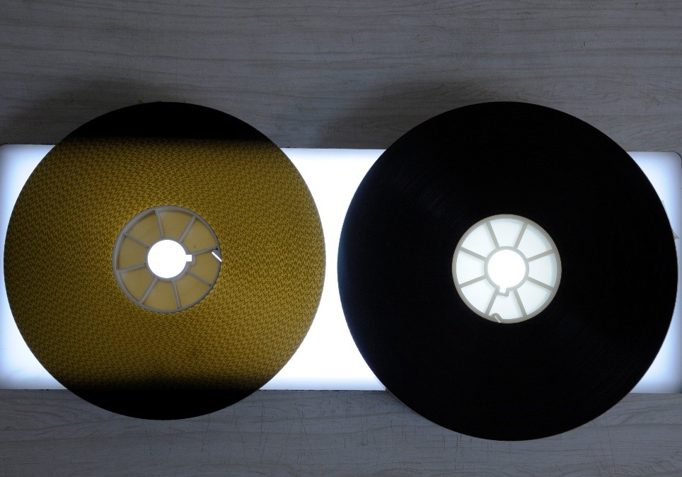 two reels of different types of film