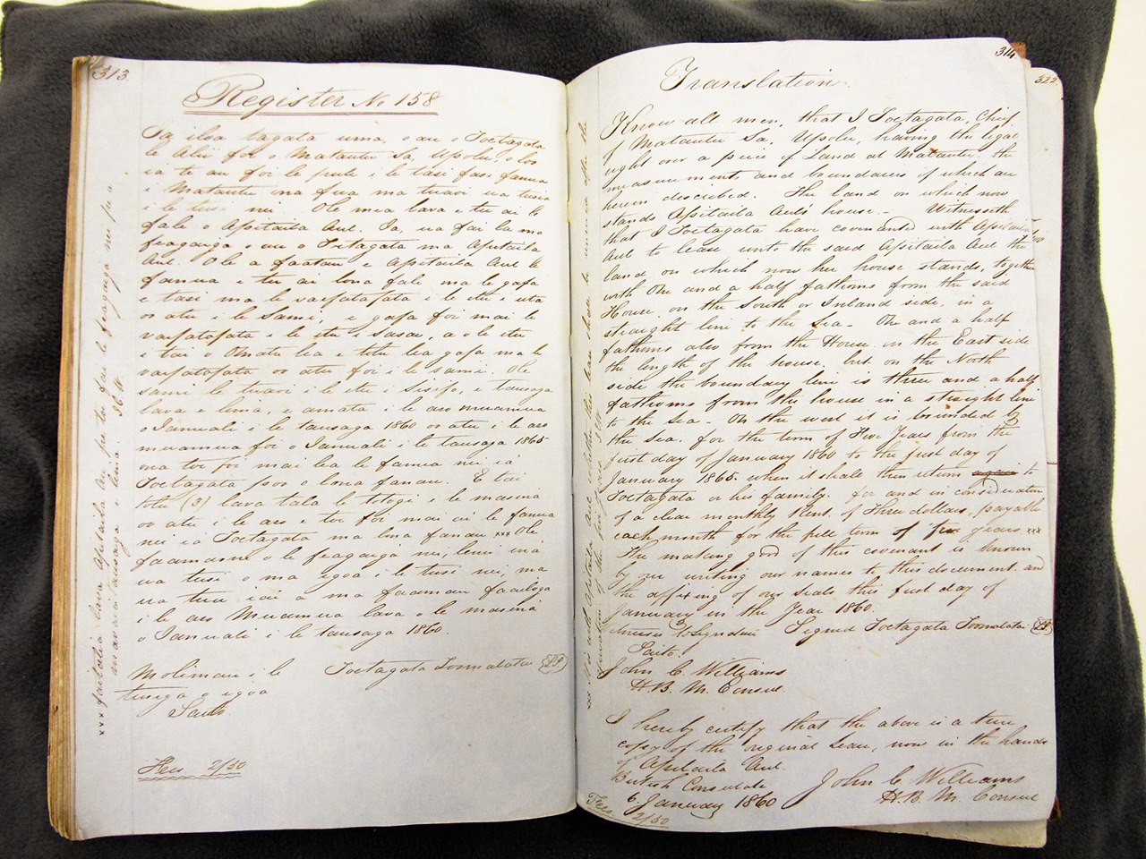 Deeds Register Volume 8 (158 p.313) Photograph of a large book of handwritten script