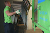 Junk Run team member removing office furniture. Junk Run team member removing office furniture.