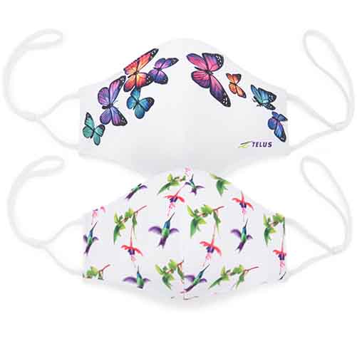 Two white facemasks with the TELUS logo, one with multicoloured butterflies and one with hummingbirds.