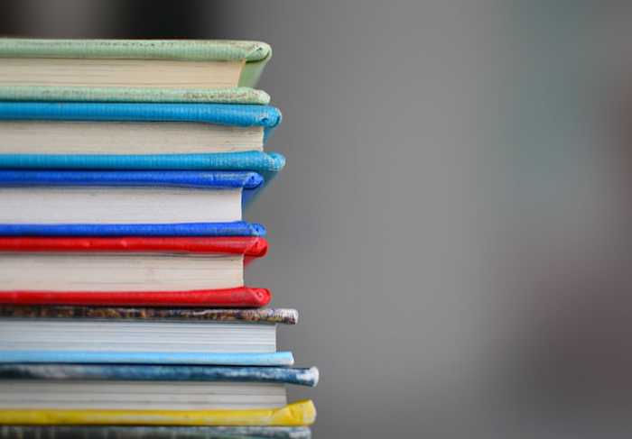 Stack of books with colored covers.