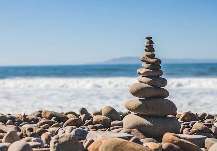 Rocks stacked on a rocky beach.
