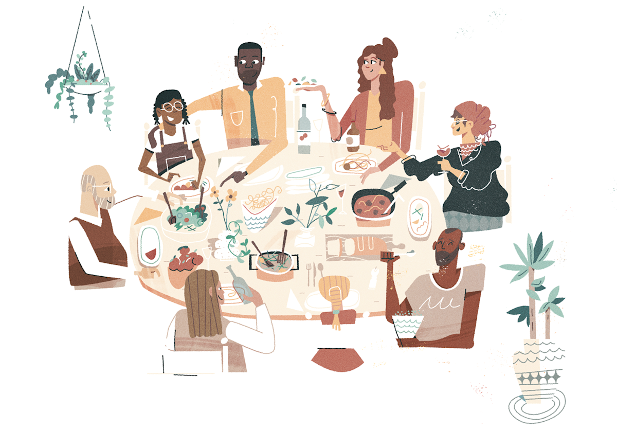 Multi-generational family sharing a meal together at a table