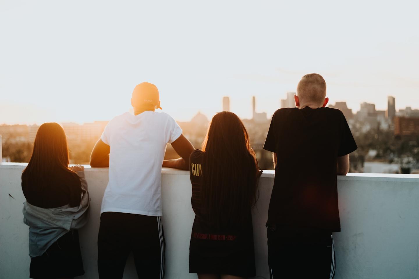group of people looking at city