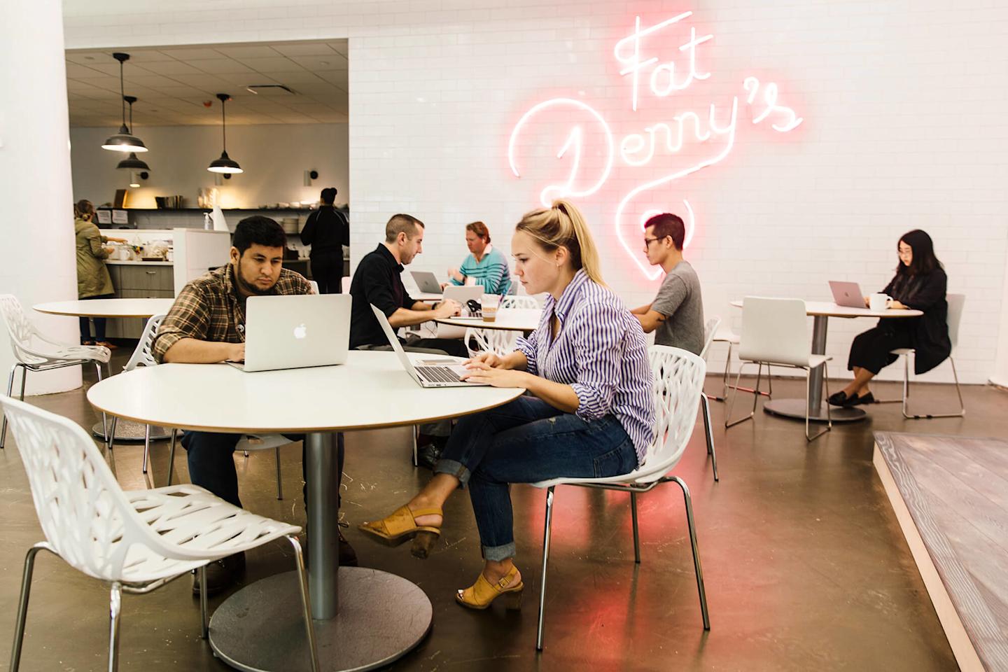 Foursquare employees working in cafeteria