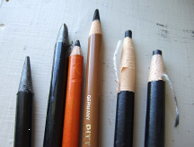 Graphite and charcoal pencils of different types