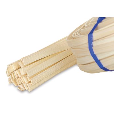 Natural Reed For Basketmaking - Edge of coil of flat reed slightly unrolled