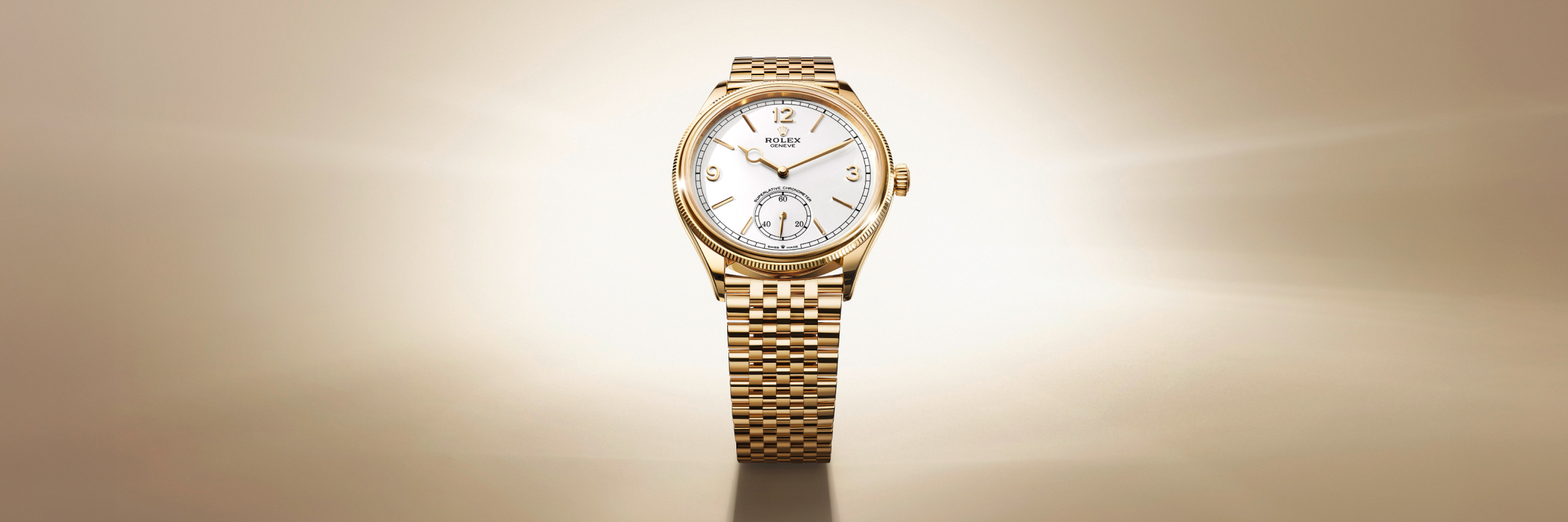 A sophisticated wristwatch with a light blue face and intricate details, surrounded by a stainless steel case. It features a brown leather strap. The background is a gradient of light blue to white, creating a radiant effect behind the watch.