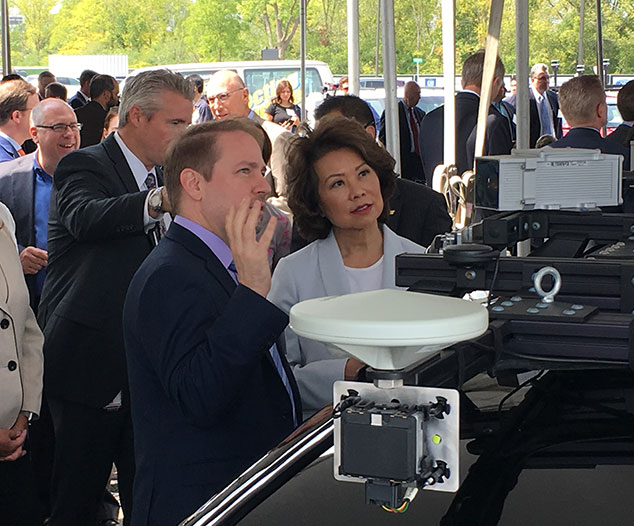 TRI CTO Dr. James Kuffner Presents to U.S. DOT Secretary Elaine Chao