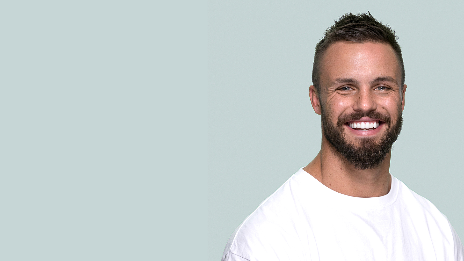 Sandor Earl, NRL footballer, after receiving his non-invasive Picasso Porcelain Veneers™️ from Dr Dee.