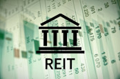Building with REIT Inscription