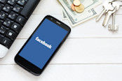 Facebook on White Background with Money