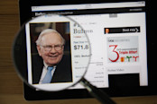 Warren Buffett and Magnifier Glass