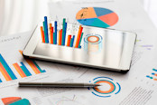 graphs and charts on a tablet