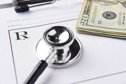 Stethoscope and blank prescription sheet