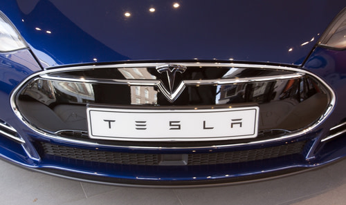 tesla name on a car