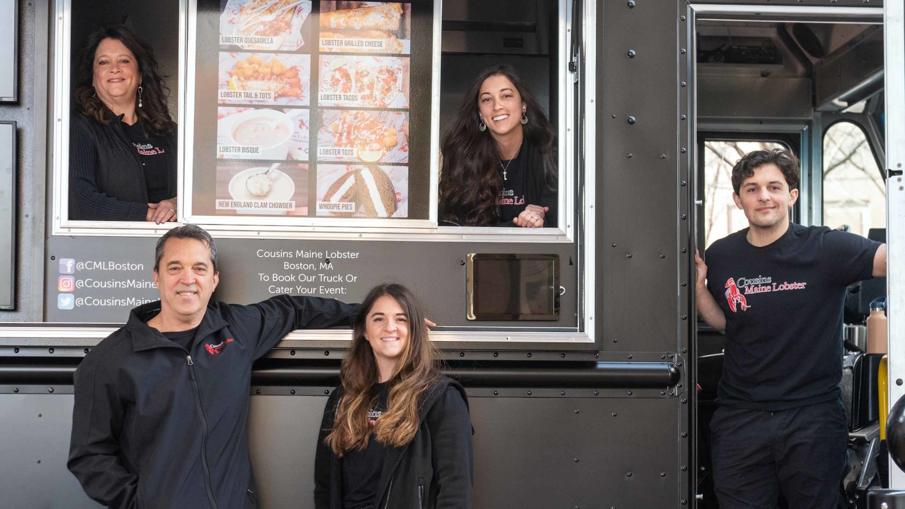 A family photos of Cousins Maine Lobster Boston owners standing inside and outside their food truck.
