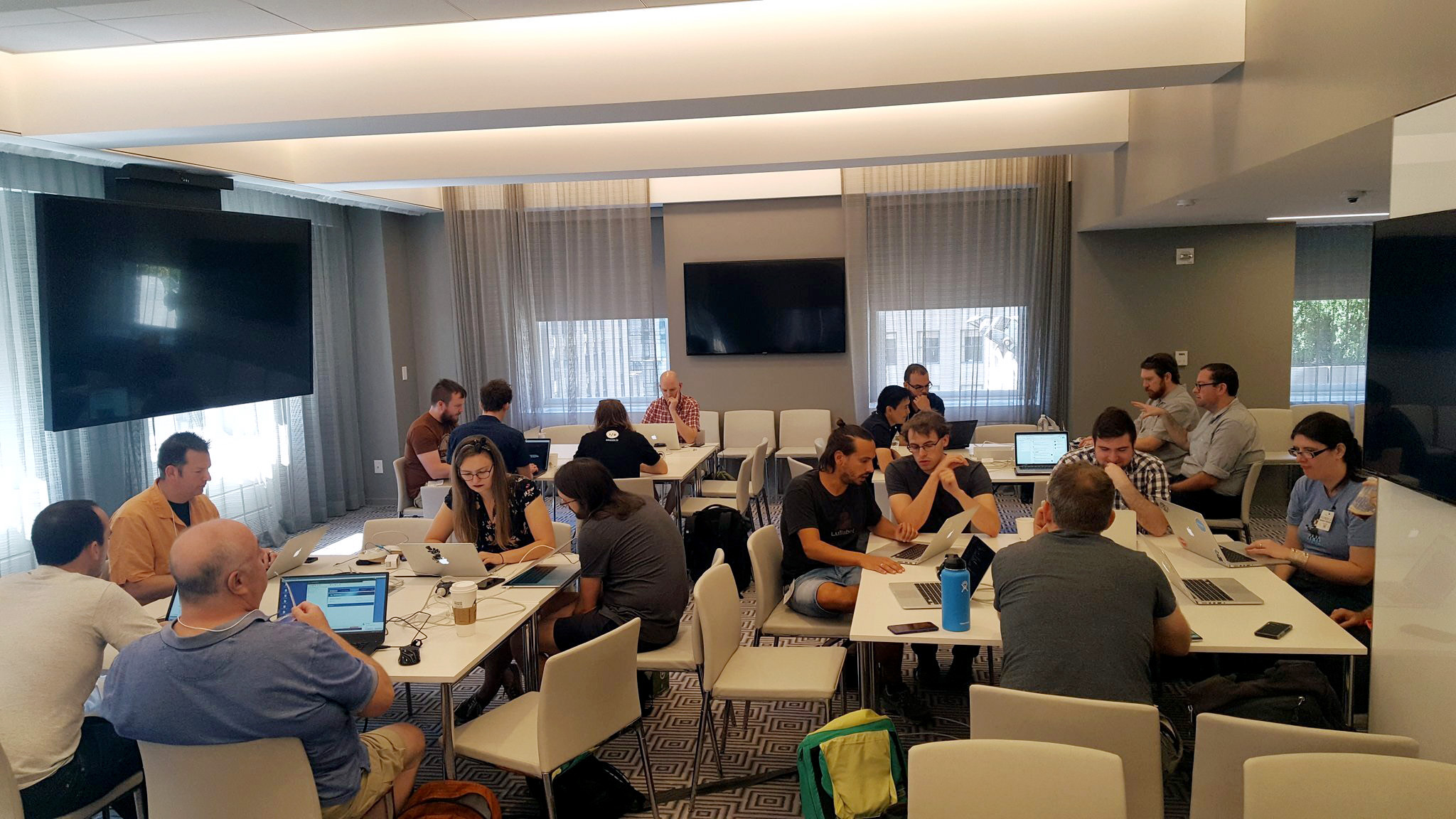 Decoupled Days attendees in deep concentration at the first Contribution Day at our inaugural edition.