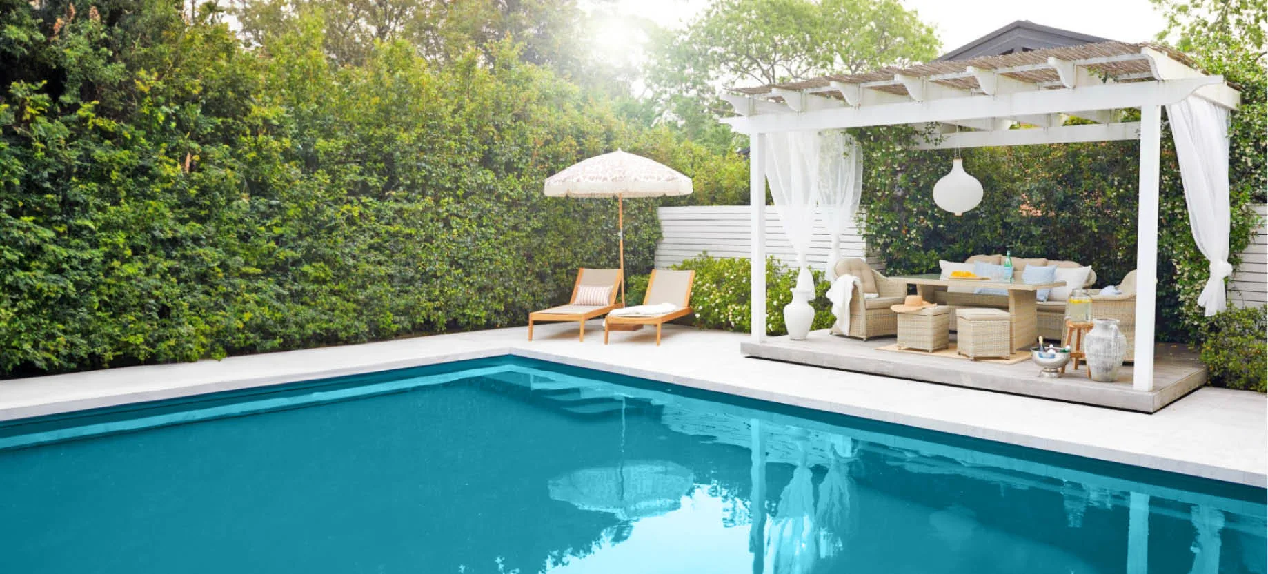 Set up comfortable seating and dining areas poolside for ultimate relaxation and entertainment