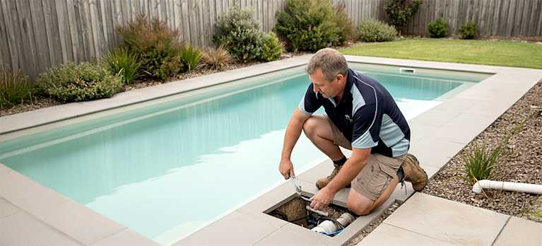 man fixing a magnesium pool