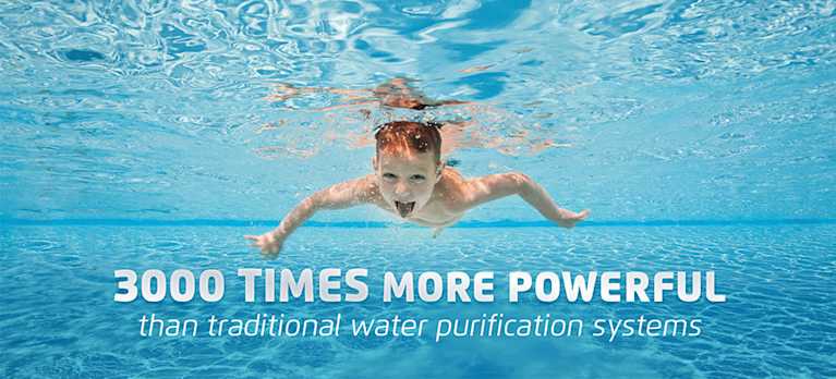 child swimming underwater of a mineral pool