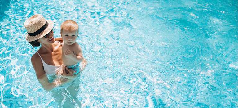 BrandImage EcoSwim mother-with-little-son-having-fun-pool web