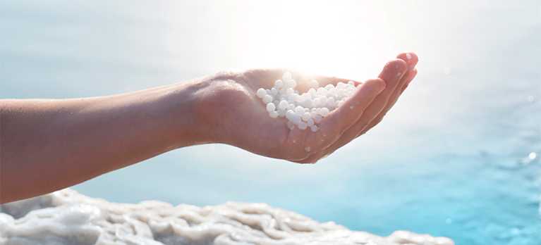 hand with mineral swim