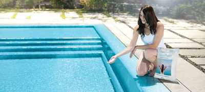 mineral swim being poured to a magnesium pool