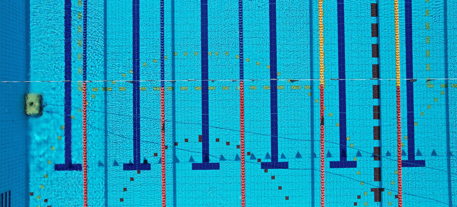 Commercial Pool being cleaned by a Wave Robot Pool Cleaner