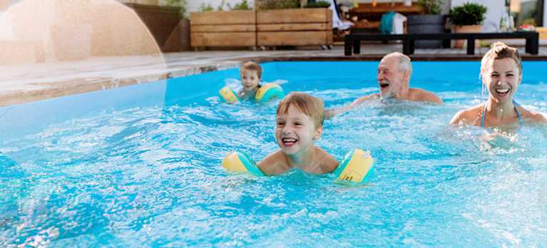 family playing in a magnesium pool