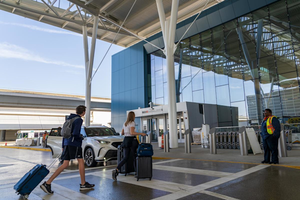 Passengers walking into IAH Terminal E