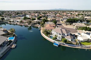 Aerial view of Glendale, AZ with houses near a river