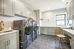 Washer and dryer in a washing room